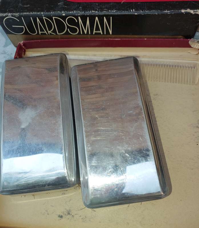 A LEATHER WALLETS AND A SET OF GROOMING BRUSHES