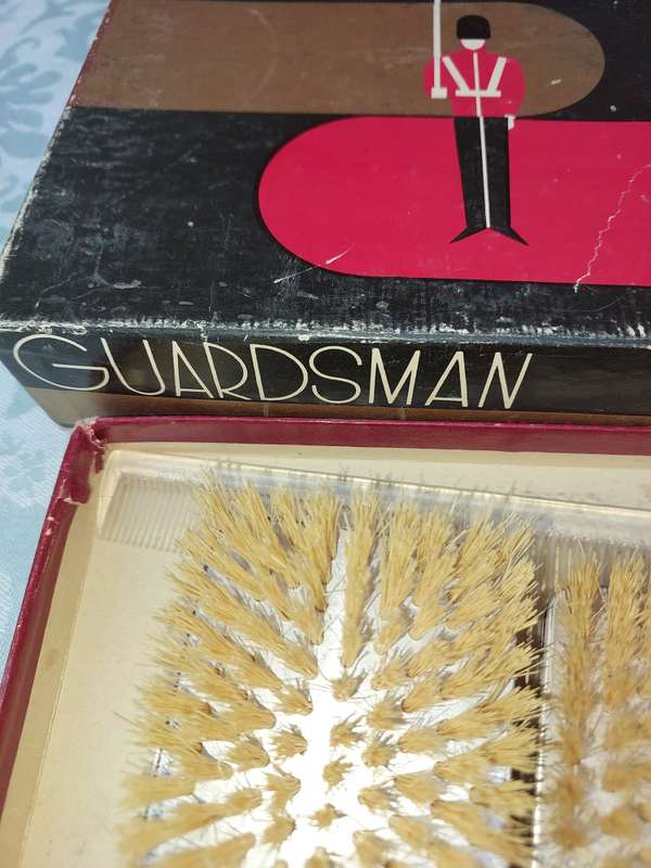 A LEATHER WALLETS AND A SET OF GROOMING BRUSHES