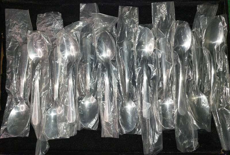A COLLECTION OF 12 STAINLESS STEEL TEASPOONS VIRTUALLY BRAND NEW