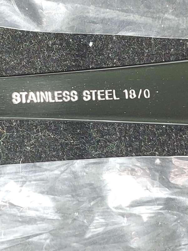 A COLLECTION OF 12 STAINLESS STEEL TEASPOONS VIRTUALLY BRAND NEW