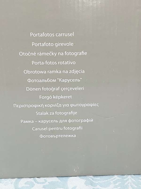 A PHOTO CARROUSEL SOLD AS IS
