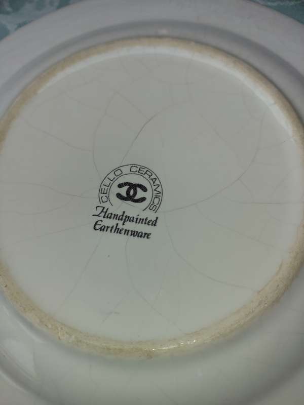 A COLLECTION OF 9 CELLO CERAMICS HAND-PAINTED EARTHEN WARE