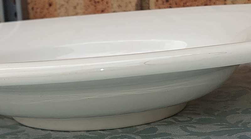 A WOOLWORTHS ROUND PLATTER MADE IN ITALY PORCELAIN