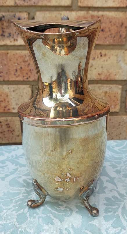 AN ANTIQUE REGAL A1 SILVER PLATED ON COPPER  JUG