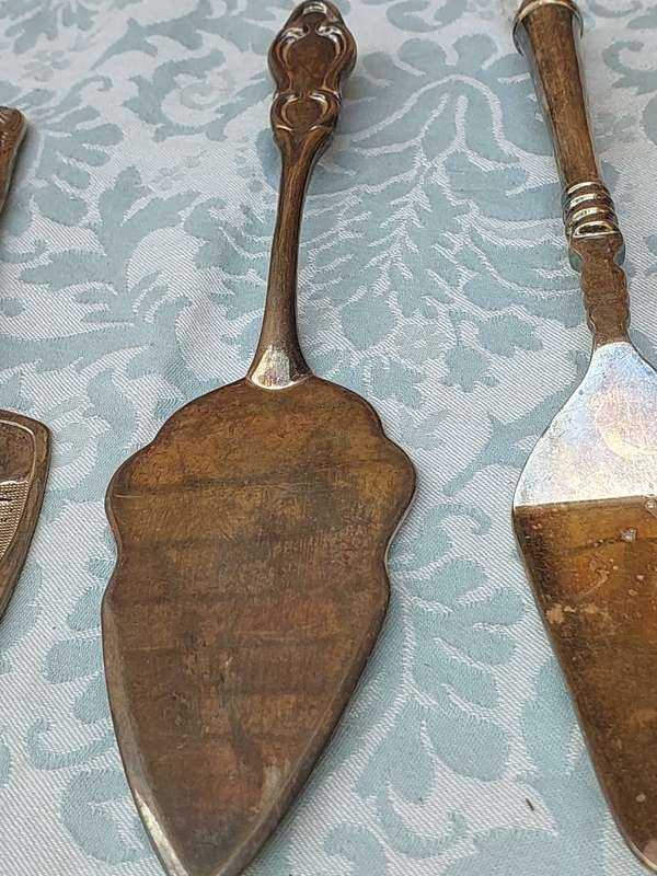 THREE VINTAGE HEAVY DUTY CAKE CUTLERY