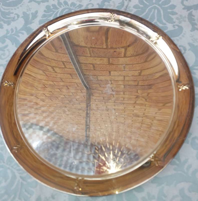 A STAINLESS STEEL SERVING TRAY SOLD A