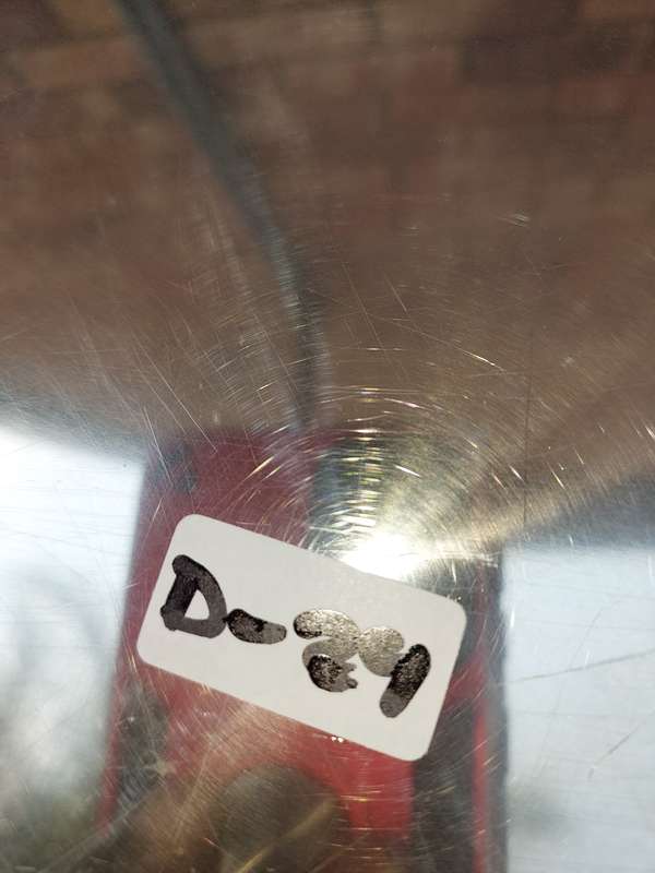 A STAINLESS STEEL SERVING TRAY SOLD A