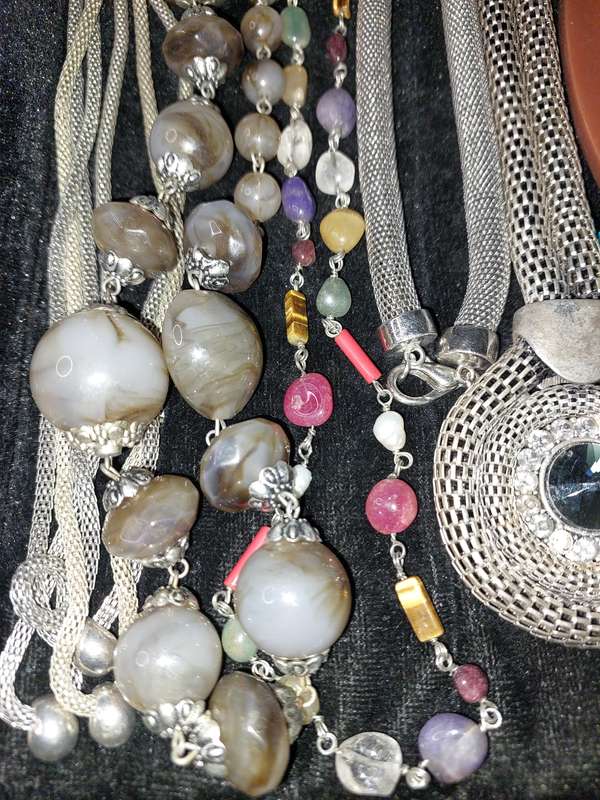 A COLLECTION OF QUALITY COSTUME NECKLACES SOLD AS IS