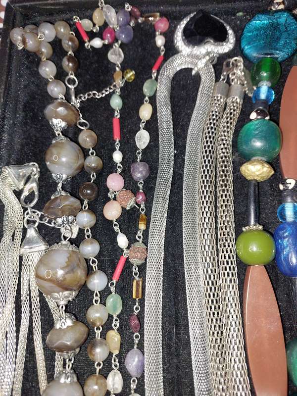 A COLLECTION OF QUALITY COSTUME NECKLACES SOLD AS IS
