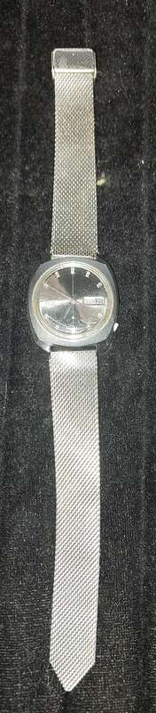 A VINTAGE SEIKO 5 AUTOMATIC STAINLESS STELL JAPAN 6119-7080T AD IN WORKING CONDITION SOLD AS IS