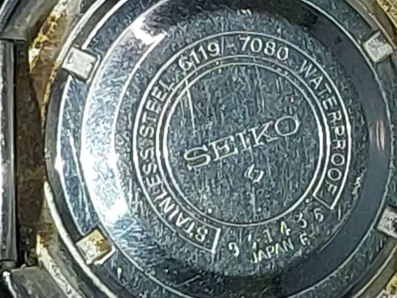A VINTAGE SEIKO 5 AUTOMATIC STAINLESS STELL JAPAN 6119-7080T AD IN WORKING CONDITION SOLD AS IS