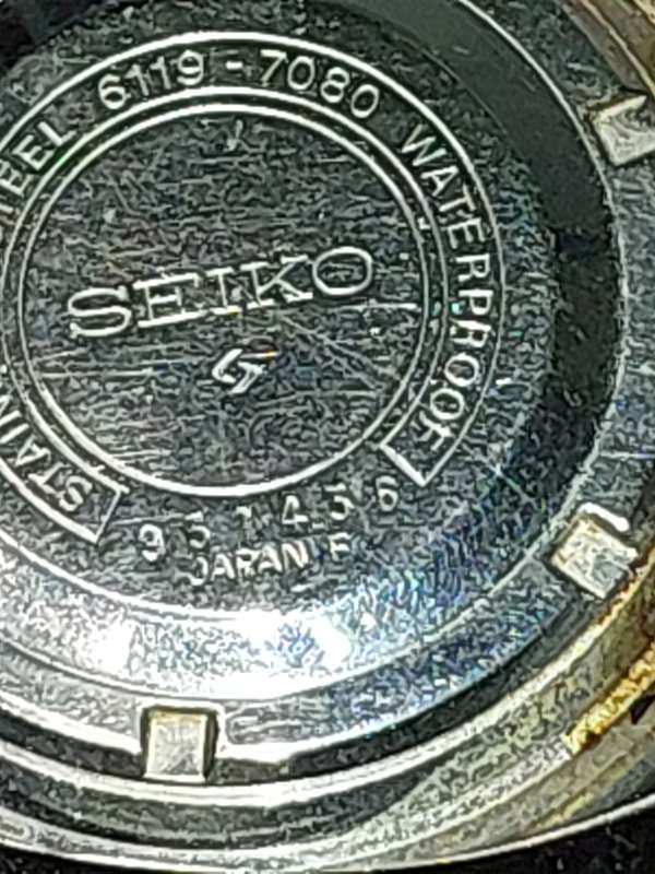 A VINTAGE SEIKO 5 AUTOMATIC STAINLESS STELL JAPAN 6119-7080T AD IN WORKING CONDITION SOLD AS IS