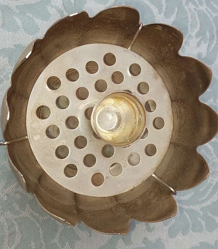 A LOTUS BOWL CANDELABRA SILVER PLATED ON BRASS MADE IN HONG KONG
