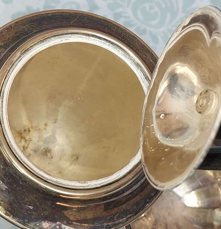 AN ANTIQUE TEA JUG SET MADE IN SHEFFIELD ENGLAND