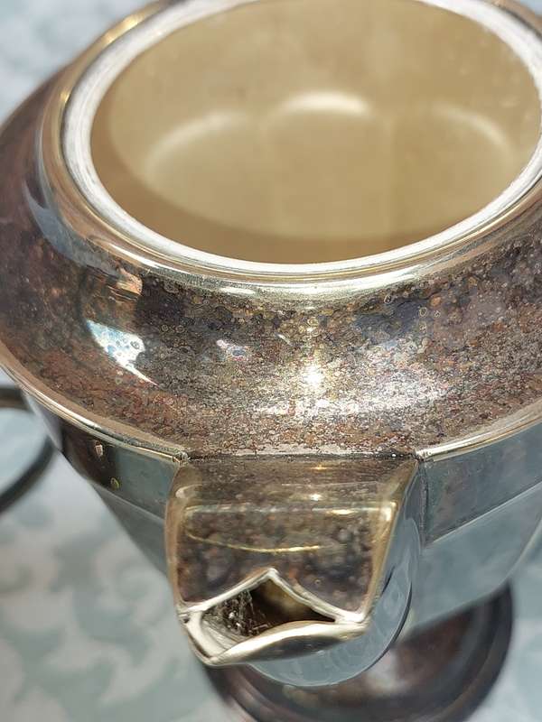 AN ANTIQUE TEA JUG SET MADE IN SHEFFIELD ENGLAND