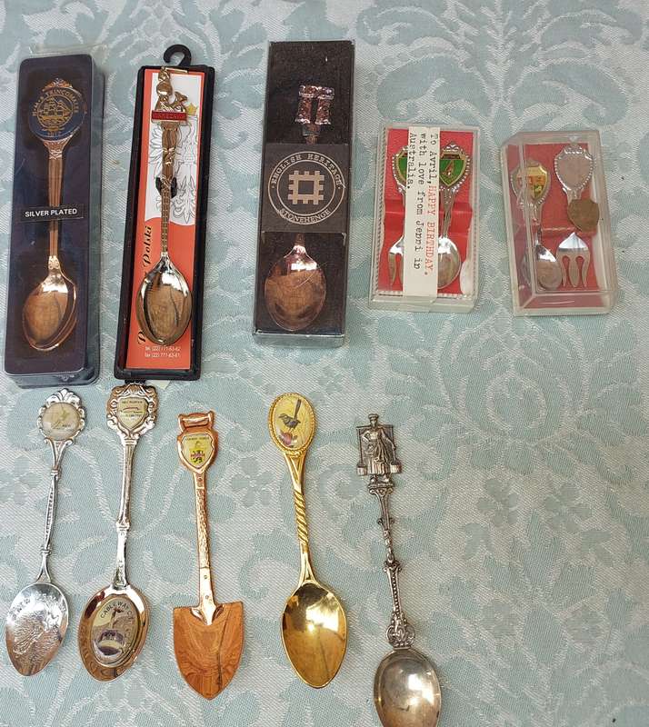 A COLLECTION OF MEMORABILIA SPOONS