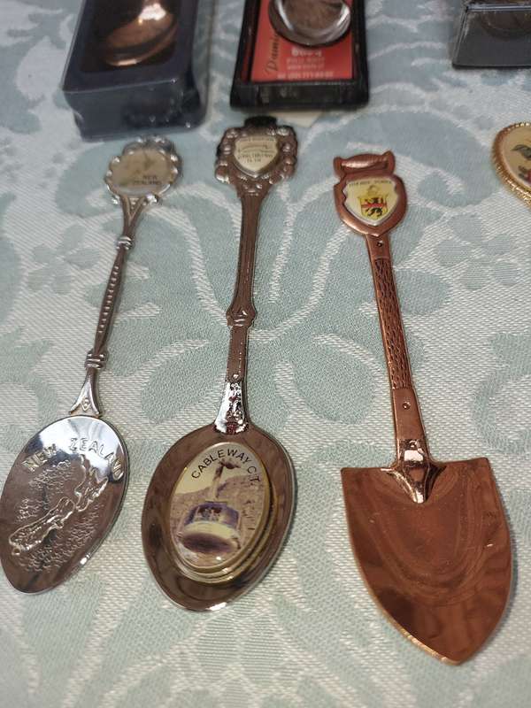 A COLLECTION OF MEMORABILIA SPOONS