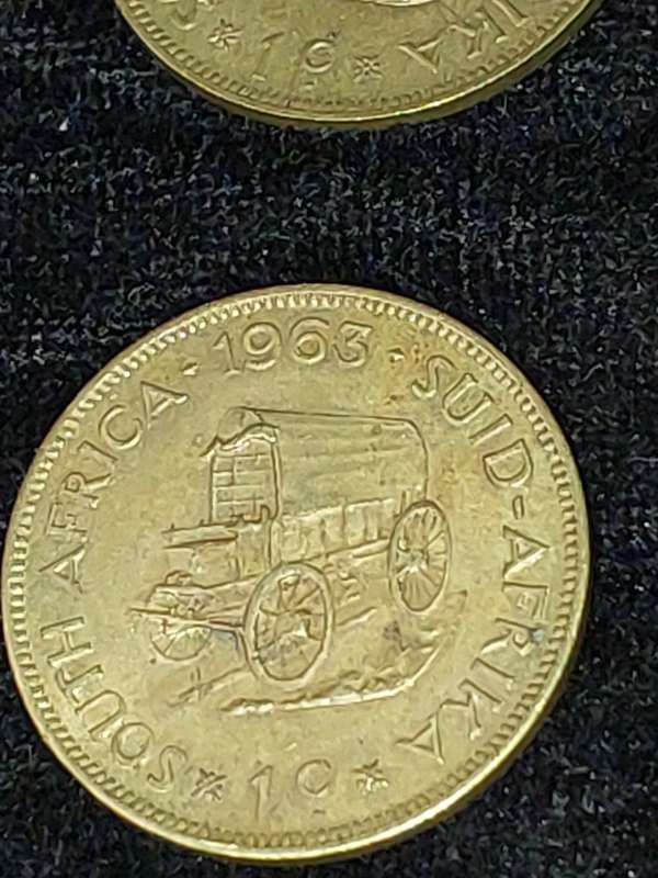 A COLLECTION OF 5 ANTIQUE  SOUTH AFRICAN BRASS 1 CENT COINS