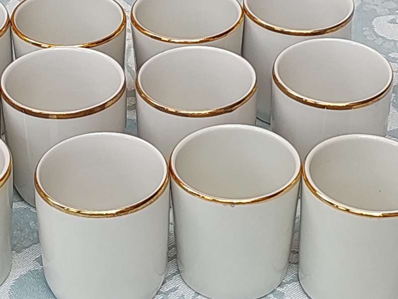 A SET OIF 12 FEDRING PORCELLANA SAUCE CUPS