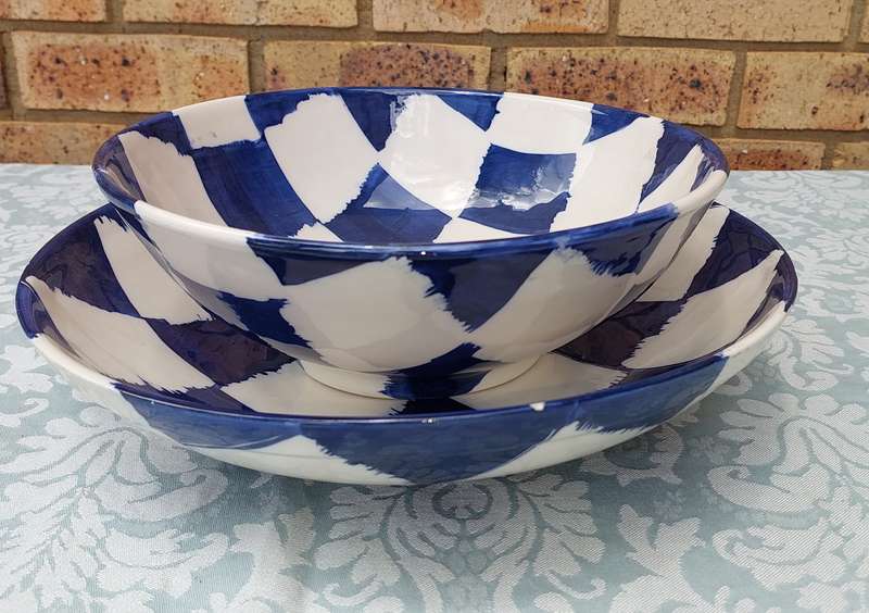 TWO CHECKERED ART DECOR SERVING BOWLS SOLD AS IS