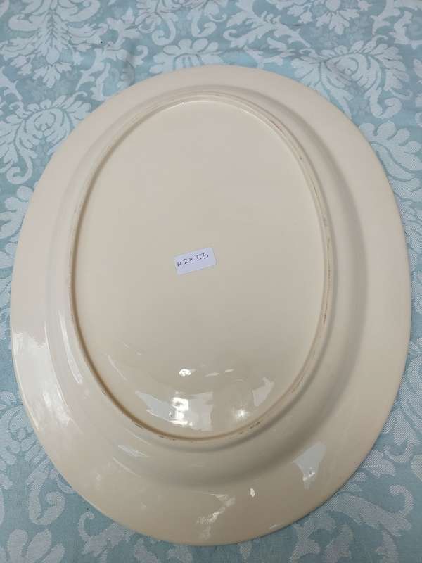 AN OVAL PORCELAIN FLORAL PATTERN SERVING PLATTER