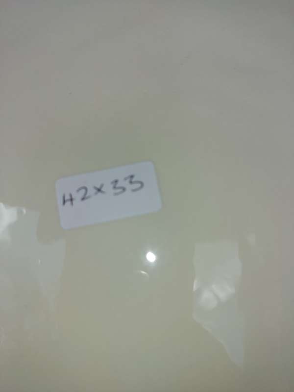 AN OVAL PORCELAIN FLORAL PATTERN SERVING PLATTER