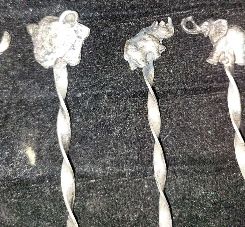 A VINTAGE SET OF BIG FIVE SOUTH AFRICAN HALF-CENT COIN SPOONS