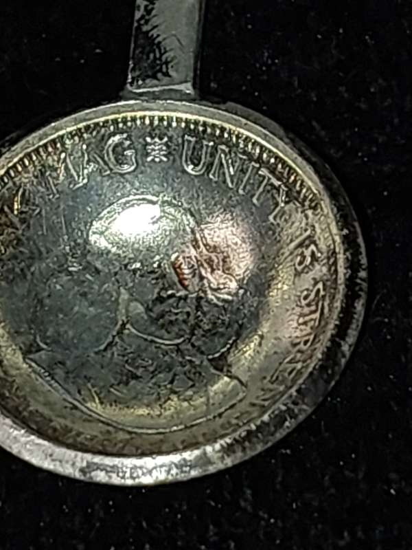 A VINTAGE SET OF BIG FIVE SOUTH AFRICAN HALF-CENT COIN SPOONS