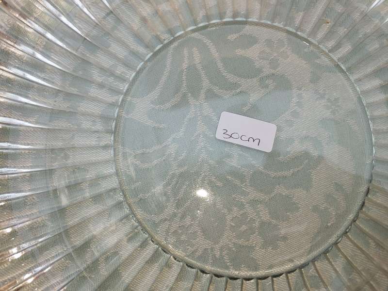 AN ENTIRE COLLECTION OF GLASS SERVING PLATTERS