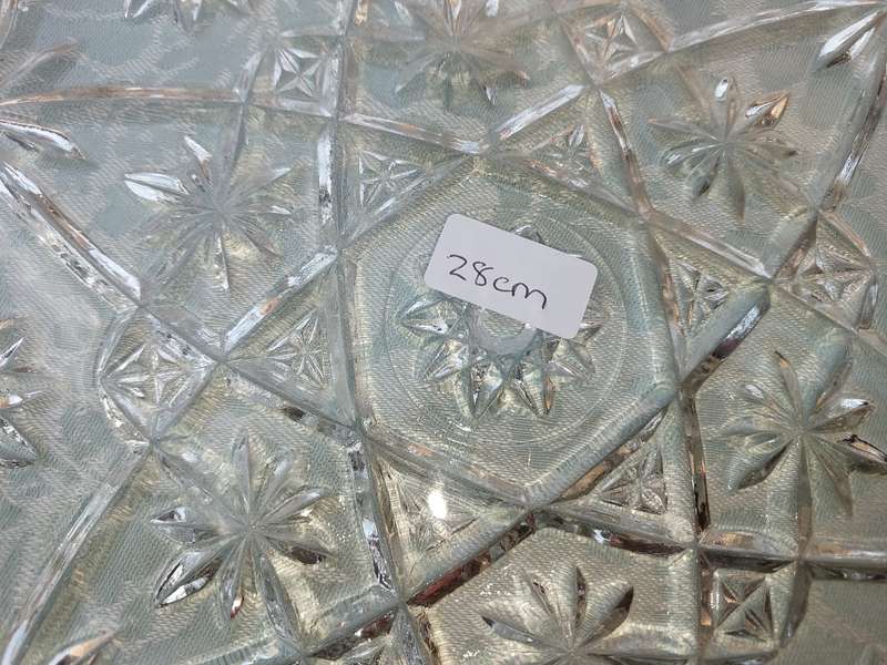 AN ENTIRE COLLECTION OF GLASS SERVING PLATTERS