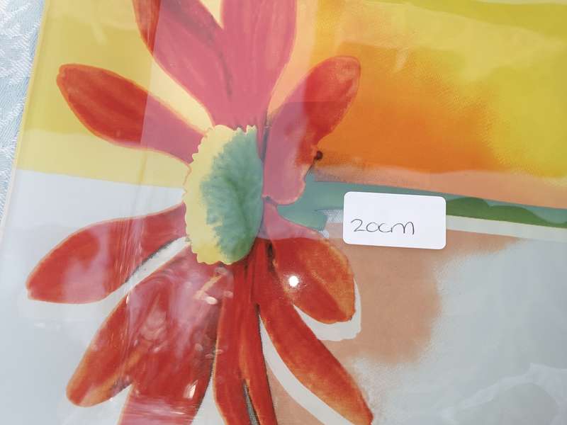 AN ENTIRE COLLECTION OF GLASS SERVING PLATTERS