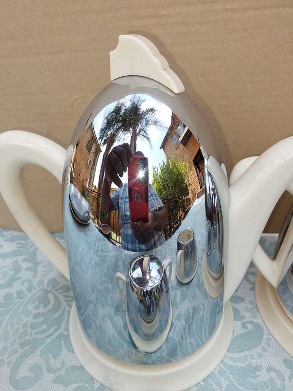 AN ANTIQUE TEA JUG SET MADE IN ENGLAND CERAMIC WITH SILVER PLATED COVERS SOLD AS