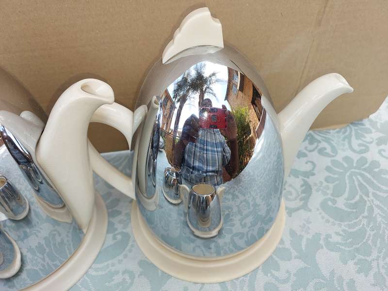 AN ANTIQUE TEA JUG SET MADE IN ENGLAND CERAMIC WITH SILVER PLATED COVERS SOLD AS