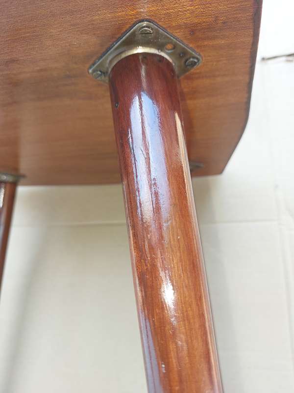 A VINTAGE DANISH-STYLE WOODEN SIDE TABLE WITH BRASS FOOTED LEGS