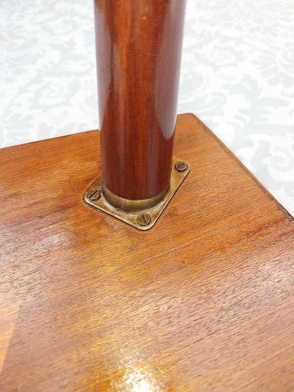 A VINTAGE DANISH-STYLE WOODEN SIDE TABLE WITH BRASS FOOTED LEGS