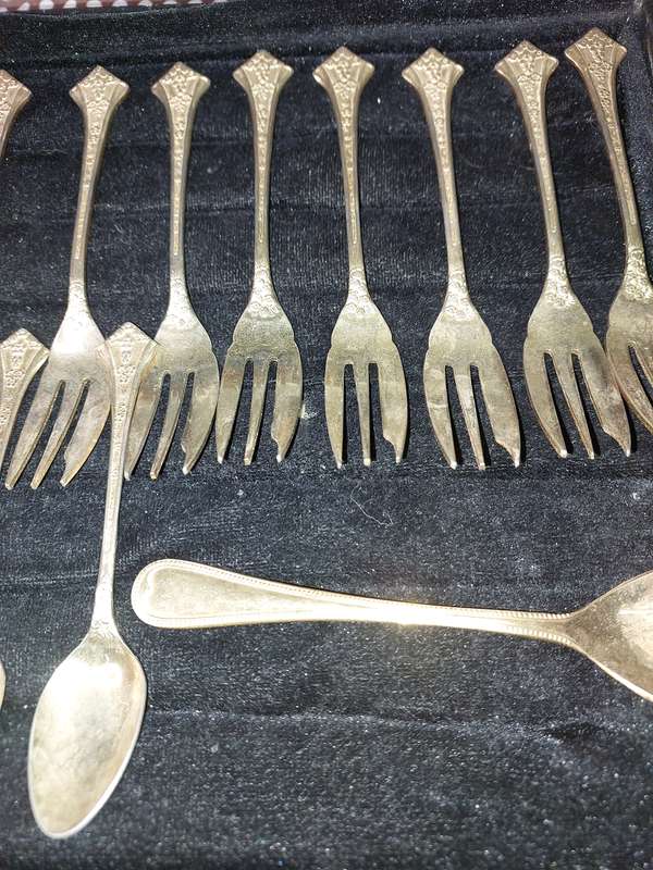 A COLLECTION OF 20 DESERT FORKS AND SPOONS