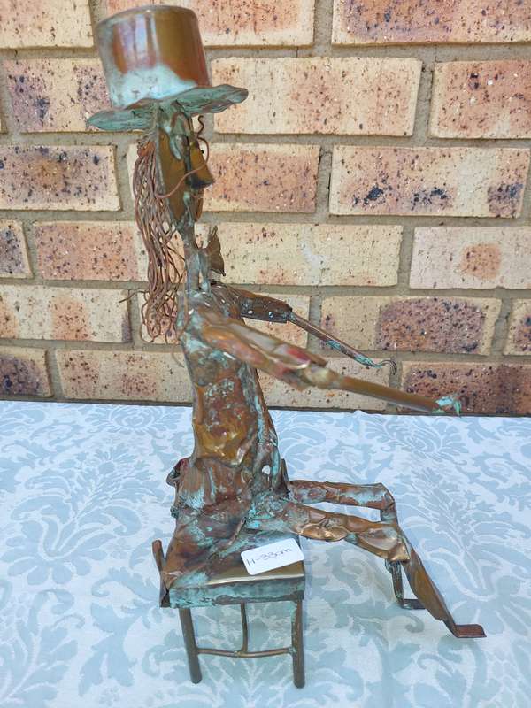 A COLLECTION OF COPPER FIGURINE ART SCULPTURES A PIANIST ,A PIANO WITH A SAXOPHONIST AND A BICYCLE