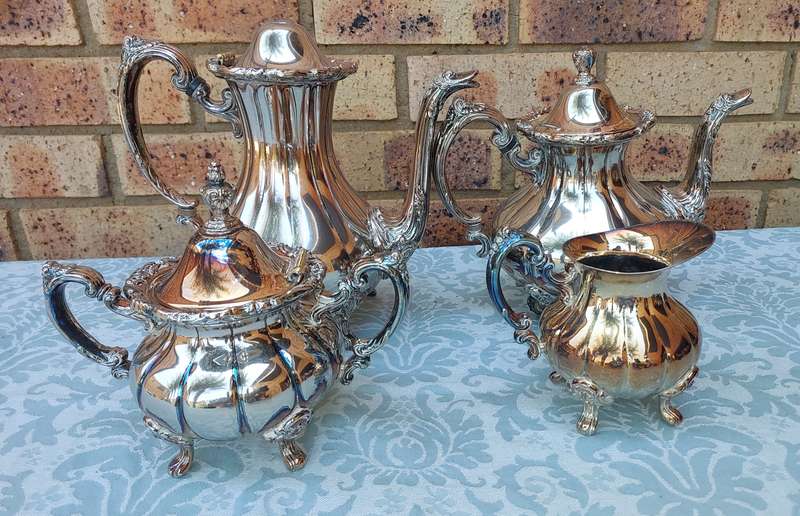 A VINTAGE VICTORIAN SILVER PLATED  JUG TEA SET THAT NEEDS SOME REPAIRS