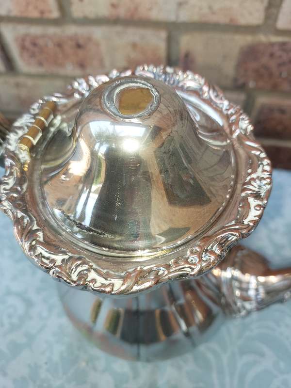 A VINTAGE VICTORIAN SILVER PLATED  JUG TEA SET THAT NEEDS SOME REPAIRS