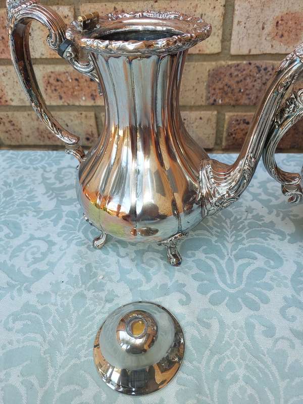 A VINTAGE VICTORIAN SILVER PLATED  JUG TEA SET THAT NEEDS SOME REPAIRS