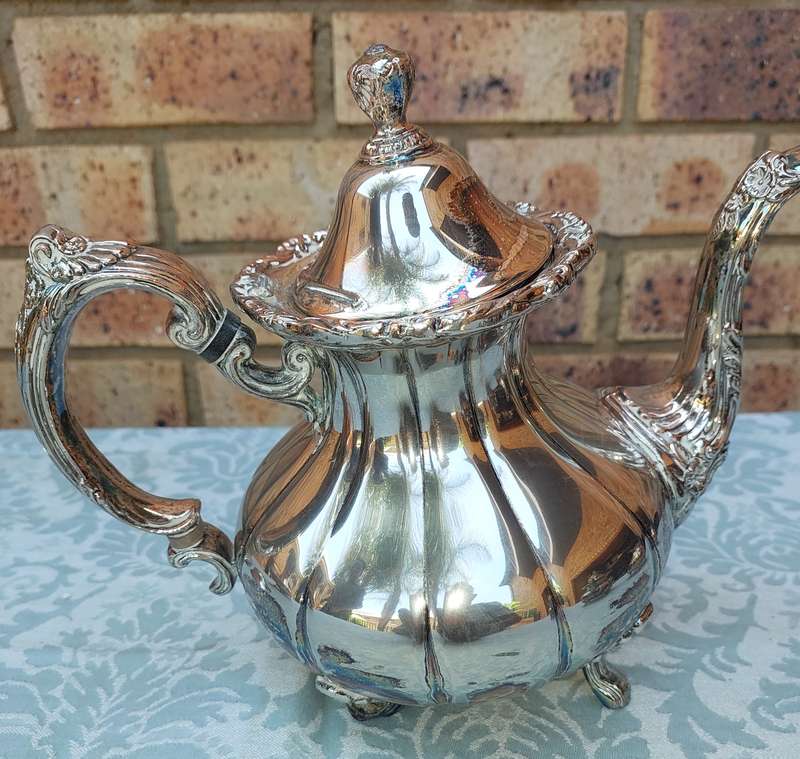 A VINTAGE VICTORIAN SILVER PLATED  JUG TEA SET THAT NEEDS SOME REPAIRS