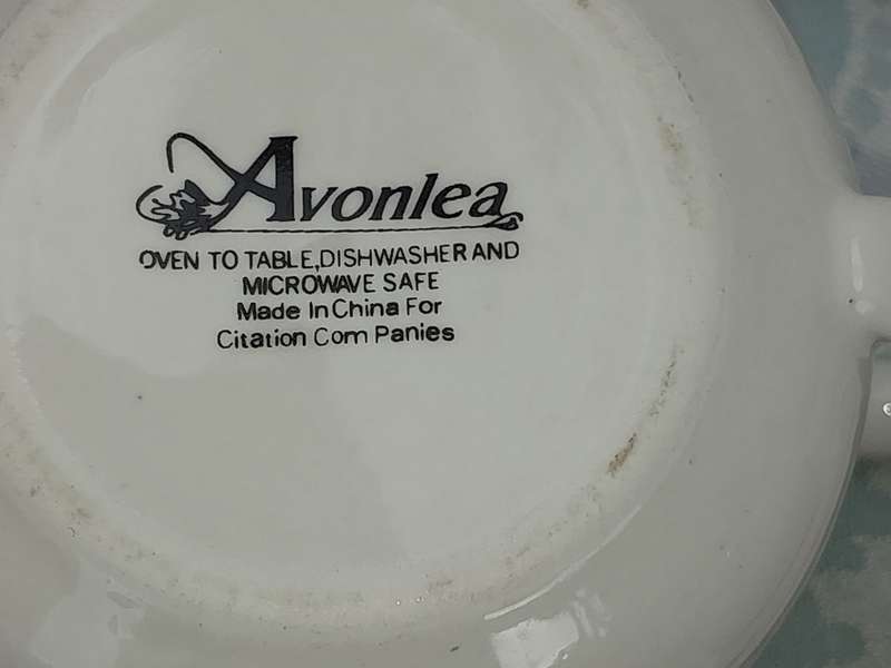 A COLLECTION OF 10 CUPS, 12 SAUCERS ,AND A MILK JUG AVONLEA