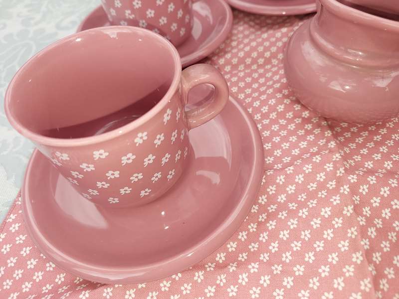 AN 11 PIECE PINK COFFEE CUP AND SAUCER  SET MADE IN DENMARK