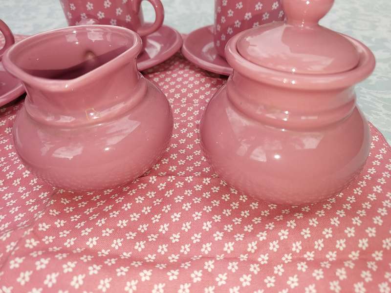 AN 11 PIECE PINK COFFEE CUP AND SAUCER  SET MADE IN DENMARK