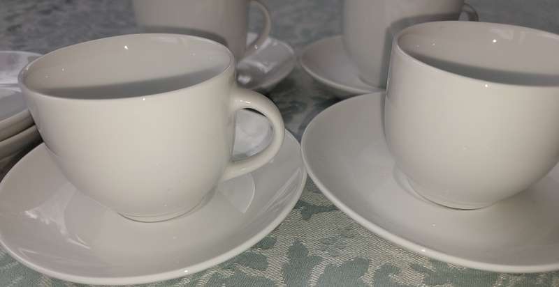 A COLLECTION OF 4 COFFEE CUPS AND SIX SAUCERS BY BOARDMANS