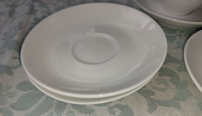 A COLLECTION OF 4 COFFEE CUPS AND SIX SAUCERS BY BOARDMANS