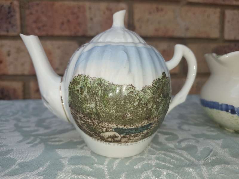 A COLLECTION OF 3 VINTAGE PORCELAIN JUGS SOLD AS IS
