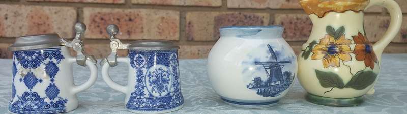 A VINTAGE COLLECTION OF DUTCH PORCELAIN MEMORABILIA & FIGURINES