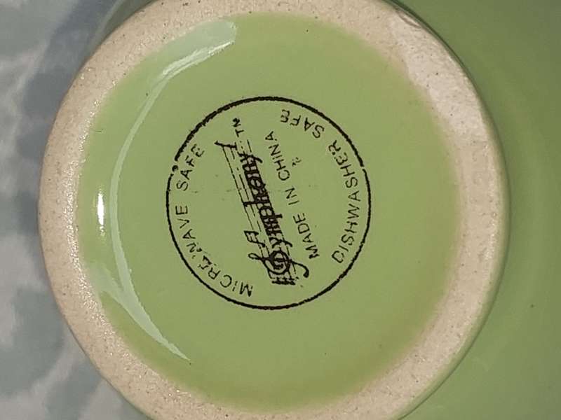 A SET OF 4 COFFEE CUPS AND 2 SAUCER MULTI COLOURED SYMPHONY