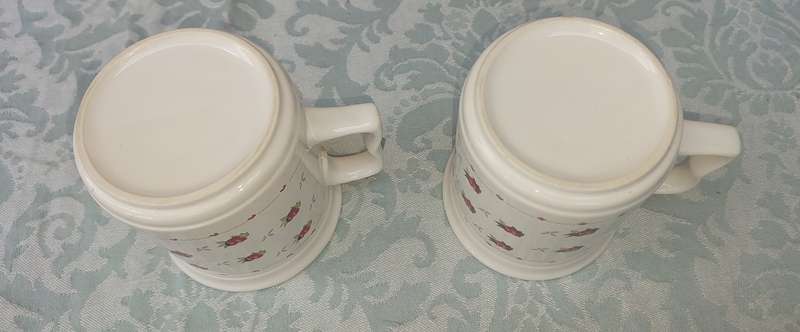 TWO COFFE CUPS PORCELAIN SOLD AS IS